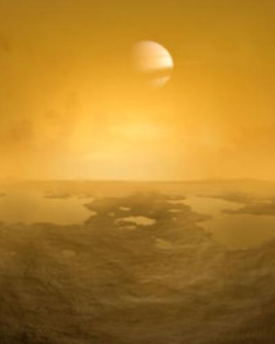 Titan&#039;s surface covered in orange organic compounds